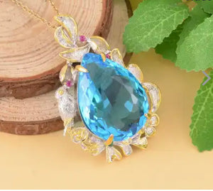 Swiss Blue Topaz Pendant Necklace - Simulated purple and green Diamond in dualtone goldtone and Stainless Steel